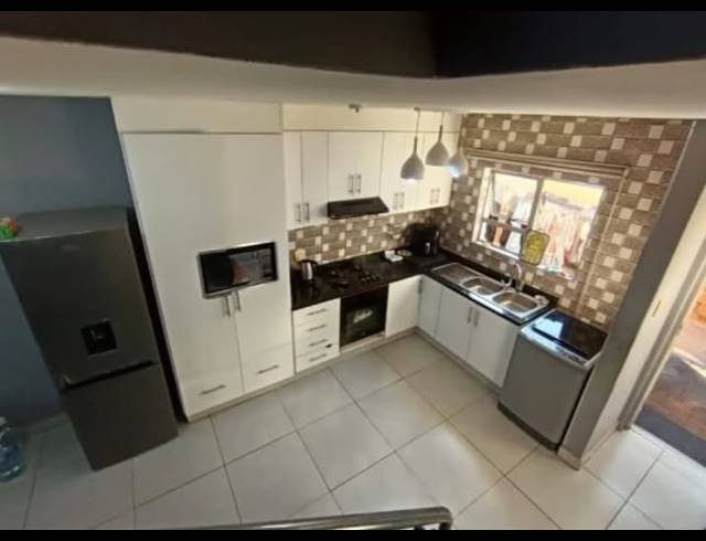 2 BEDROOM DUPLEX SOLD IN GREENWOOD PARK